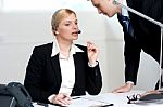 Female Executive Discussing Business Issue Stock Photo