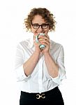 Female Executive Drinking Coffee Stock Photo