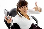 Female Giving Telephone Receiver Stock Photo