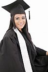 Female Graduate Wearing A Gown And Mortarboard Stock Photo