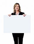 Female holding blank board Stock Photo