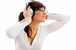 Female Listening Music Stock Photo