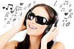 Female Listening To Music Stock Photo