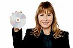 Female Manager Showing Compact Disc Stock Photo