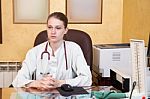 Female Medical Doctor In A Hospital Office Stock Photo