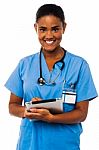 Female Physician Holding Tablet Pc Stock Photo