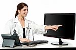 Female Physician In Her Clinic Stock Photo