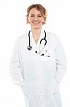 Female Physician In White Uniform Stock Photo