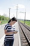 Female Reading Map Book Stock Photo