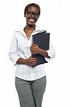 Female Representative Holding File Stock Photo