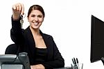 Female Secretary Offering You Cabin Key Stock Photo