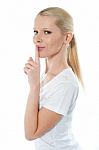 Female Showing Silence Sign Stock Photo