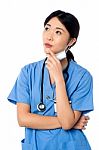 Female Surgeon Thinking Something Stock Photo