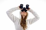 Female Watching Upward Through Binocular Stock Photo