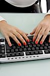 Female working keyboard Stock Photo