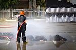 Fireman. Firefighters Fighting Fire During Training Stock Photo