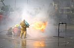 Fireman. Firefighters Fighting Fire During Training Stock Photo