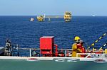 Fireman Is Guarding For Offshore Helicopter Before Start Up Engi Stock Photo