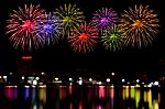 Fireworks Celebration And The City Night Light Background Stock Photo