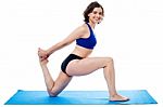 Fit Woman Doing Bent Knees Exercise Stock Photo