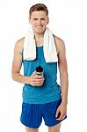 Fitness Guy Holding Sipper Bottle Stock Photo