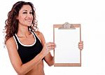 Fitness Lady Showing Clip Board Stock Photo