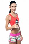 Fitness Woman Holding Sipper Bottle Stock Photo