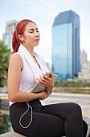 Fitness Woman Listening To Music Stock Photo