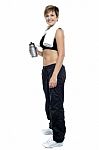 Fitness Woman Posing After Workout. Holding Water Bottle Stock Photo