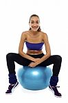Fitness Woman Relaxing On Exercise Ball Stock Photo