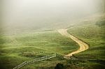 Foggy Morning In A Village On The Hills Stock Photo