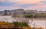 Foggy River In The Morning. Misty Dawn At Summer. Misty Morning Stock Photo