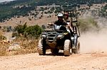 Four Wheeler Riding Stock Photo