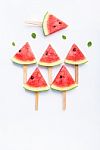 Fresh And Sweet Watermelon Slice Popsicles On White Background Stock Photo