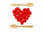 Fresh Grape Or Cherry Tomato With Wooden Spoon On White Backgrou Stock Photo