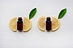 Fresh Lemon Slices With Lemon Essential Oil  Stock Photo