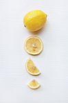 Fresh Lemon With Slices  On White Stock Photo