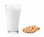 Fresh Milk In The Glass With Soy Beans On White Background Stock Photo