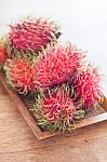 Fresh Rambutans On Wodden Tray Stock Photo