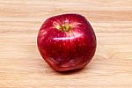 Fresh Red Apple On Wood Background Stock Photo