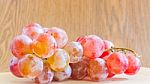 Fresh Red Grapes On Wooden Background Stock Photo