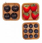 Fresh Summer Fruits, Cherry, Strawberry, And Blueberry In Wooden Stock Photo