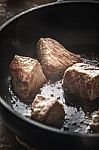 Fried Angus Beef In The Hot Pan Vertical Stock Photo