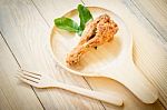 Fried Chicken In Batter  On A Wooden Background Stock Photo