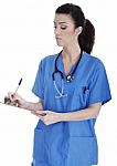 Friendly Nurse Making Medical Notes Stock Photo