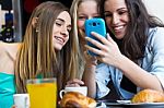 Friends Having Fun With Smartphones Stock Photo