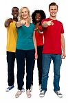 Friends Showing Pointing Forward Stock Photo