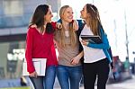 Friends Talking In The Street After Class Stock Photo