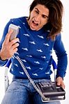 Front View Of Angry Man Shouting On Phone Stock Photo