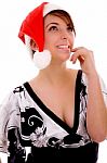 Front View Of Cheerful Woman In Christmas Hat Stock Photo